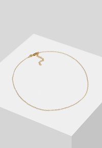 Collana in oro con maglie ovali e chiusura sicura, dotata di catena regolabile per maggiore versatilità. Superficie liscia.