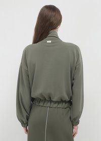 Calliope CON TASCHE - Felpa con zip - verde militare chiaro