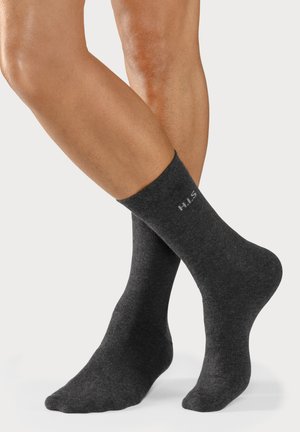 Dark gray crew socks made of soft fabric. Features a ribbed cuff with embroidered "H.I.S." logo near the top. Smooth texture, classic design.
