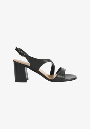 Black leather slingback sandal with two crossed straps, square toe, and a chunky heel. Features an adjustable buckle on the ankle strap.