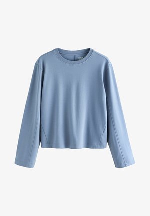 Helles blaues Langarmshirt aus weichem Material, mit runder Ausschnittform und lässiger Passform, versehen mit genähten Details an den Ärmeln.