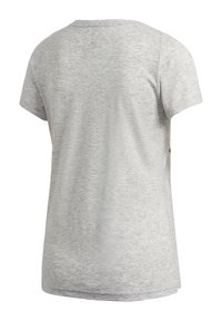 T-shirt gris à manches courtes en coton doux, uni, avec un col arrondi et une coupe décontractée. Il présente un ourlet droit et sans motifs.