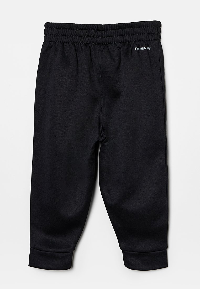 Pantaloni da jogging neri con vita elastica e polsini alle caviglie, con piccolo logo bianco sul lato sinistro in alto.