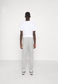 Nike Sportswear Cargobyxor - mottled dark grey