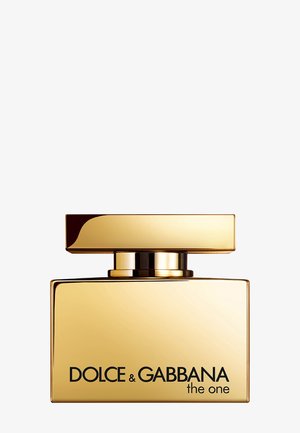 Flacon de parfum rectangulaire doré avec texte noir Dolce & Gabbana the one à l'avant et un large bouchon plat doré.