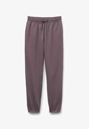 Pantaloni grigi in felpa realizzati in un tessuto morbido, dotati di una vita elastica con cordino, gambe affusolate e polsini elastici alla caviglia.