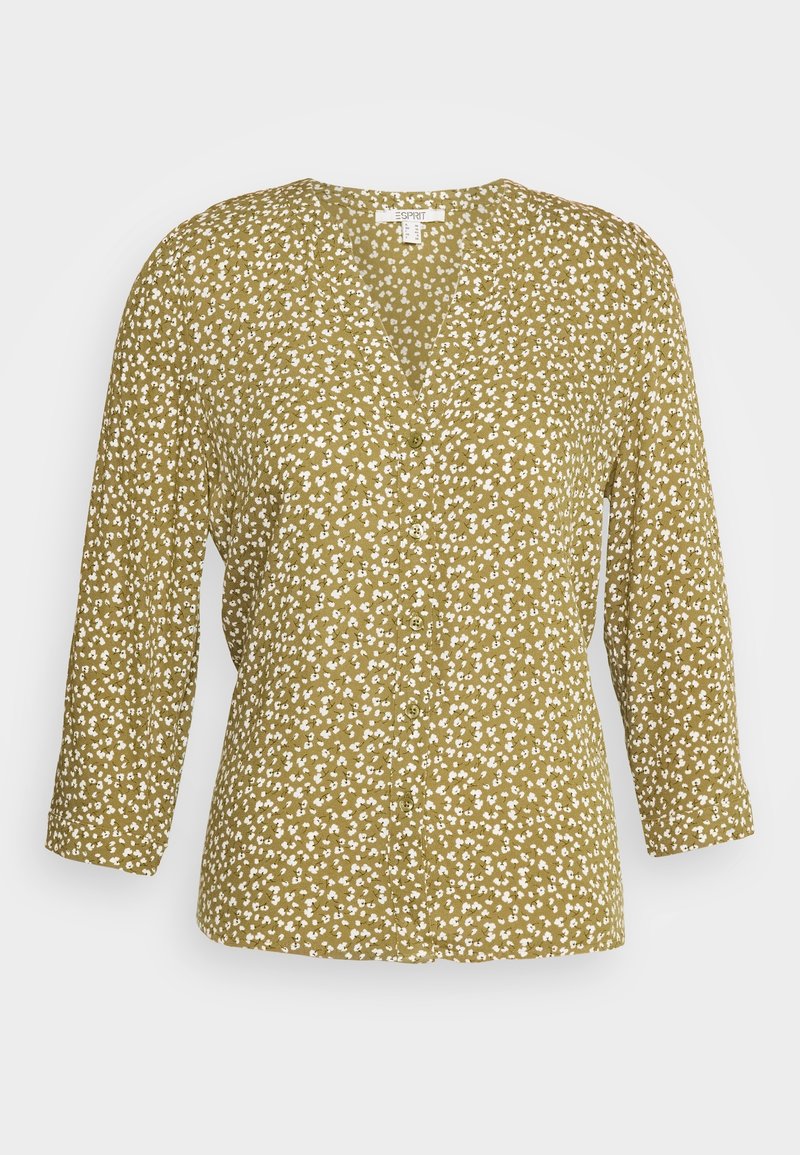 Blouse vert olive avec imprimé floral blanc, devant boutonné, décolleté en V et manches longues. Fabriquée en tissu léger avec une coupe décontractée.