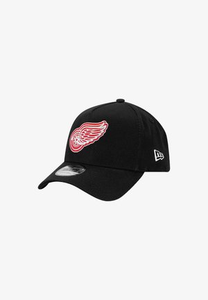 Black baseball cap with embroidered red winged logo on front, curved brim, and fabric material. Features a white logo on the side.