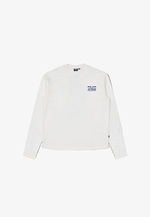 Witte lange mouwen shirt van katoen. Voorzien van een blauwe grafische print op de linkerkant van de borst. Klassieke ronde hals en rechte houten zoom.