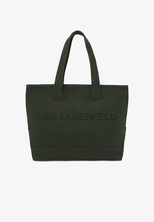 Tamsiai žalia stačiakampė rankinė su dviem rankenomis ir subtiliu "Karl Lagerfeld" logotipu priekyje centre.