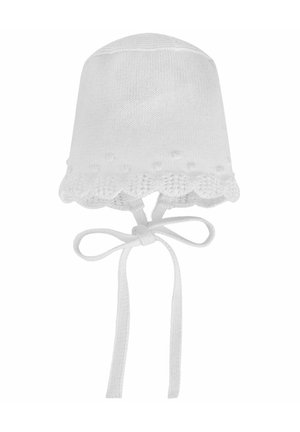 Bonnet de bébé en tricot blanc avec bordure festonnée et pompons décoratifs, doté de liens à nouer sous le menton.