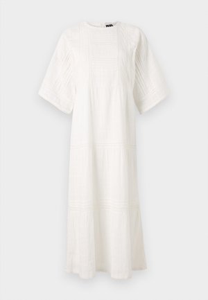 White cotton dress featuring a round neckline, short sleeves, textured patterns, and a tiered design with lace trim on the hem.