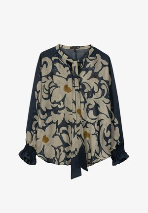Long-sleeve blouse with beige and dark navy abstract floral pattern, round neckline, tie detail, and elastic ruffle cuffs.