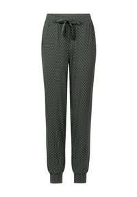 Donkergroene joggingbroeken met witte stippen, elastische tailleband met trekkoord, zijzakken en aansluitende manchetten bij de enkels.