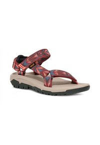 Sandalia roja con patrón, con correas ajustables, plantilla de color beige acolchada y suela de goma negra con un patrón de agarre texturizado.