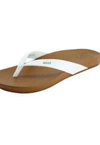 Pruunid plätud valgete sünteetiliste rihmade ja kuldse "REEF" logoga. Lame kummist tall, sile tekstuur, minimalistlik disain.