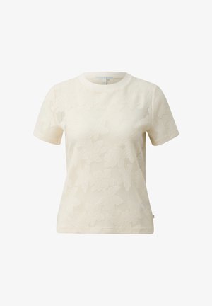 Kurzärmeliges T-Shirt aus cremefarbener Spitze mit Blumenmuster und rundem Ausschnitt, auf weißem Hintergrund dargestellt.