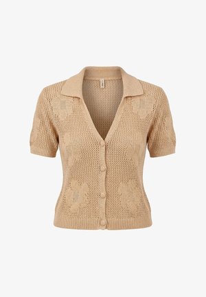 Cardigan corto beige in maglia con colletto, chiusura con bottoni sul davanti, motivi floreali in rilievo e orlo e polsini a coste.
