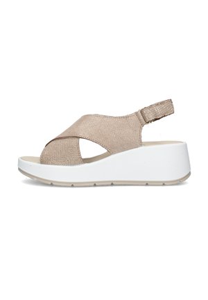 Sandalo beige con zeppa, con cinturini incrociati e testurizzati, punta aperta e cinturino posteriore regolabile, con suola bianca spessa.