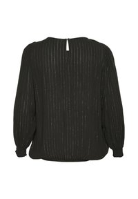 Blouse noire avec des rayures verticales, manches longues bouffantes, fermeture par une ouverture en forme de clé au dos, et un ourlet légèrement froncé. Fabriquée dans un tissu léger.