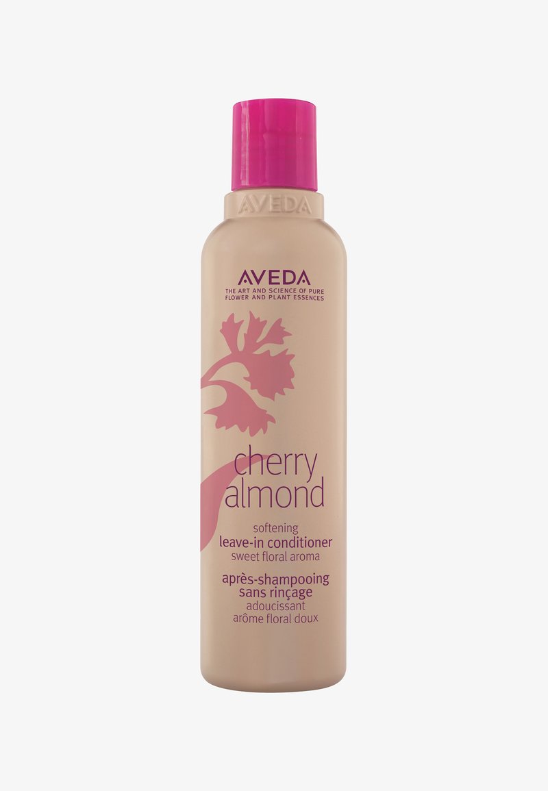 Rosa obere Cremeflasche des Aveda Cherry Almond Leave-in Conditioners. Enthält florale Grafiken und Text in lila. 8,5 fl oz. Weiche Textur.