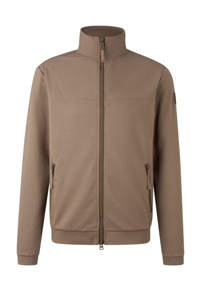 Brown zip-up jacket with stand collar, made of soft, textured fabric. Features two side pockets and minimalistic design accents.