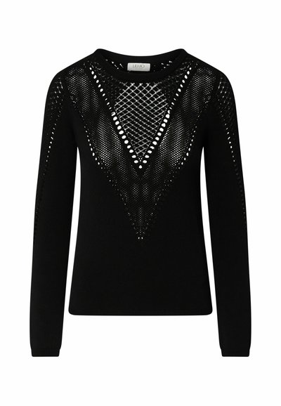 Pull en maille noir à manches longues avec des motifs géométriques ajourés sur la poitrine, les épaules et les manches, avec un col rond.