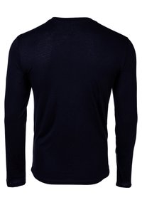 Long-sleeve black shirt in smooth cotton. Features a rounded neckline and fitted design with flat seams and no visible branding.