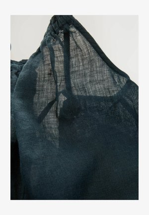 Dark green, sheer fabric with a textured, woven pattern, featuring a gathered neckline. Lightweight and translucent appearance.