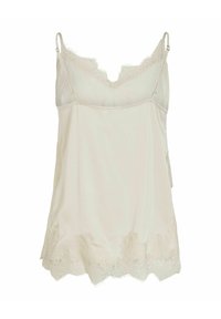 Camisole en soie couleur crème avec bretelles réglables, bordure en dentelle le long de l'encolure et de l'ourlet, tissu délicat et léger.