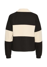 Sudadera en bloques de color con franjas horizontales en negro y crema, que presenta un cuello clásico y puños acanalados para un ajuste estructurado.
