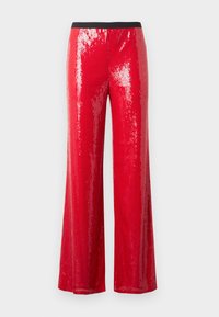 Pantalon rouge à paillettes à jambes larges avec une ceinture élastique noire, présenté sur un fond blanc uni. Aucune personne ni objet supplémentaire visible.