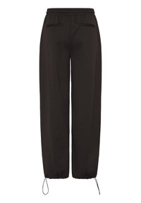 Black relaxed-fit pants with elastic waistband, two back welt pockets, and adjustable drawstrings at the hem against a white background.