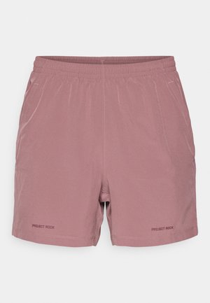 Light pink athletic shorts with an elastic waistband, minimal stitching details, and “PROJECT ROCK” logo printed on the lower left side.