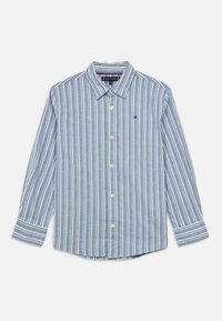 Πουκάμισο με κουμπιά σε μπλε χρώμα με κατακόρυφες ρίγες σε πράσινο και λευκό. Διαθέτει κομμένο γιακά, μακριά μανίκια και καμπύλη πίσω πλευρά με λογότυπο.