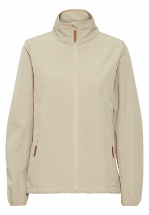 Beige softshell jacket with a high collar, front zip, side pockets, and brown leather accents on zippers and cuffs. Smooth texture.