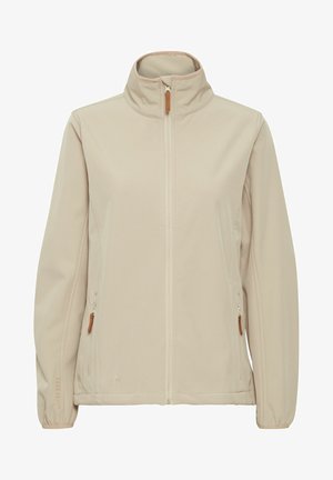 Beige softshell jacket with a high collar, front zip, side pockets, and brown leather accents on zippers and cuffs. Smooth texture.