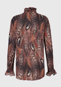 Long-sleeve blouse in lightweight fabric, featuring a colorful feather pattern in earthy tones, with a ruffled neckline and cuffed sleeves.