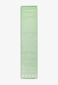 Grüne Zahnpasta-Verpackung mit Kokosgeschmack. Der Text enthält Zutaten, Anwendungshinweise und Warnhinweise. Größe: 60g (1,21 oz).