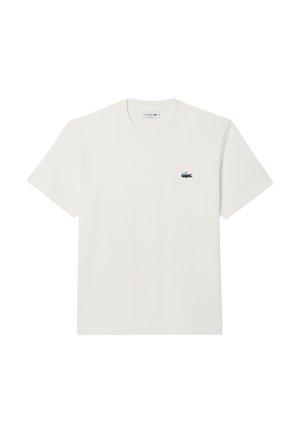 Witte katoenen T-shirt met korte mouwen en een ronde hals. Bevat een klein, geborduurd Lacoste-logo op de linkerborst.