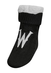 Calzini scaldamani lavorati a maglia neri con risvolto in pile bianco e una grande lettera "W" ricamata in bianco sulla parte superiore.