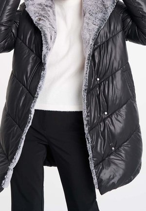 Abrigo de invierno - black