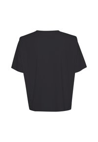 Černé oversized tričko s uvolněným střihem, krátkými rukávy a jednoduchým designem. Vyrobeno z měkké látky bez viditelných vzorů nebo akcentů.