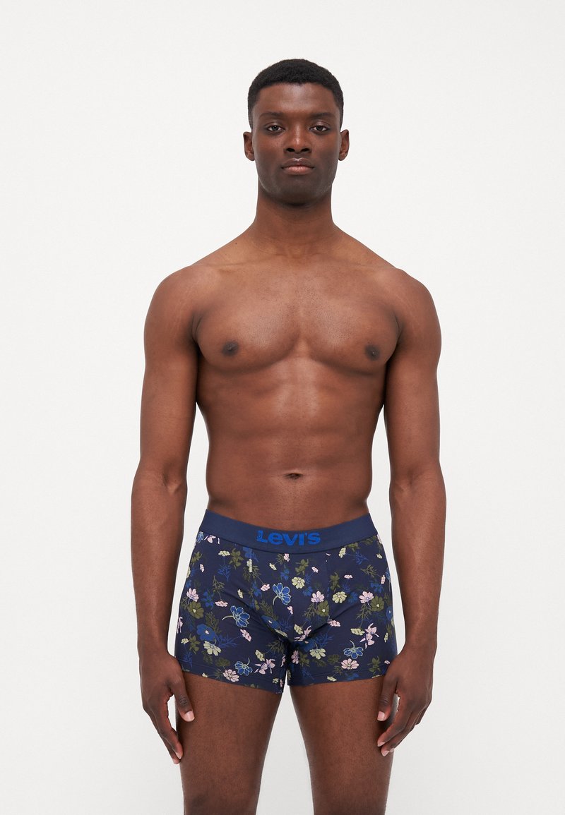 Boxershorts med ett marinblått blommönster, med en blå midjeband som har Levi's-logotypen. Tillverkade av mjukt, elastiskt material för maximal komfort.