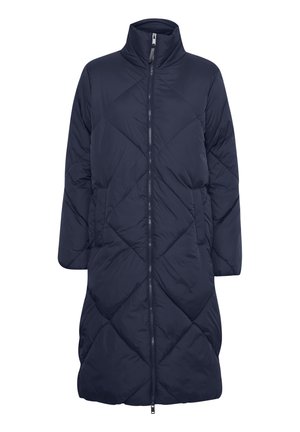 Cappotto lungo trapuntato blu navy con colletto alto, chiusura frontale con zip e tasche laterali. Presenta un motivo a diamante distintivo e una texture morbida.