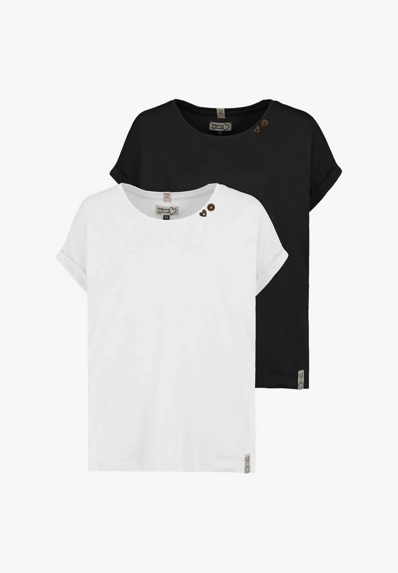 Ein Paar T-Shirts aus Baumwolle in Weiß und Schwarz, mit umgeschlagenen kurzen Ärmeln, einem runden Ausschnitt und herzförmigen Knöpfen auf einer Schulter.