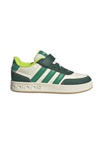 Sneaker verde e bianco con tre strisce verdi, materiali in pelle liscia e mesh, suola in gomma, colletto imbottito e strap in velcro.