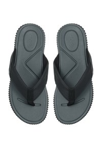 Mustat flip-flopit, joissa on teksturoitu hihna ja harmaa kumipohja, jossa on sakka- ja viivamainen kuvio. Ei näkyvää brändäystä.