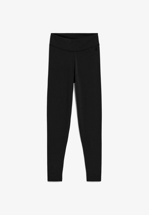 Schwarze Leggings aus dehnbarem Stoff. Mit hohem Elastikbund und minimaler Nahtverarbeitung. Glatte Textur ohne sichtbare Muster oder Akzente.