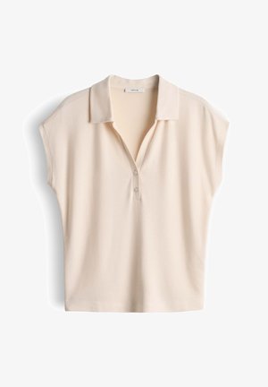 Polo beige a maniche corte con colletto e due bottoni, distesa su uno sfondo bianco.